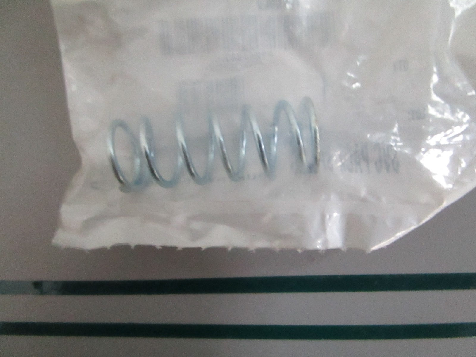 Polaris NEW OEM Spring 7042323 NOS Genuine Factory Powersport Part 0820