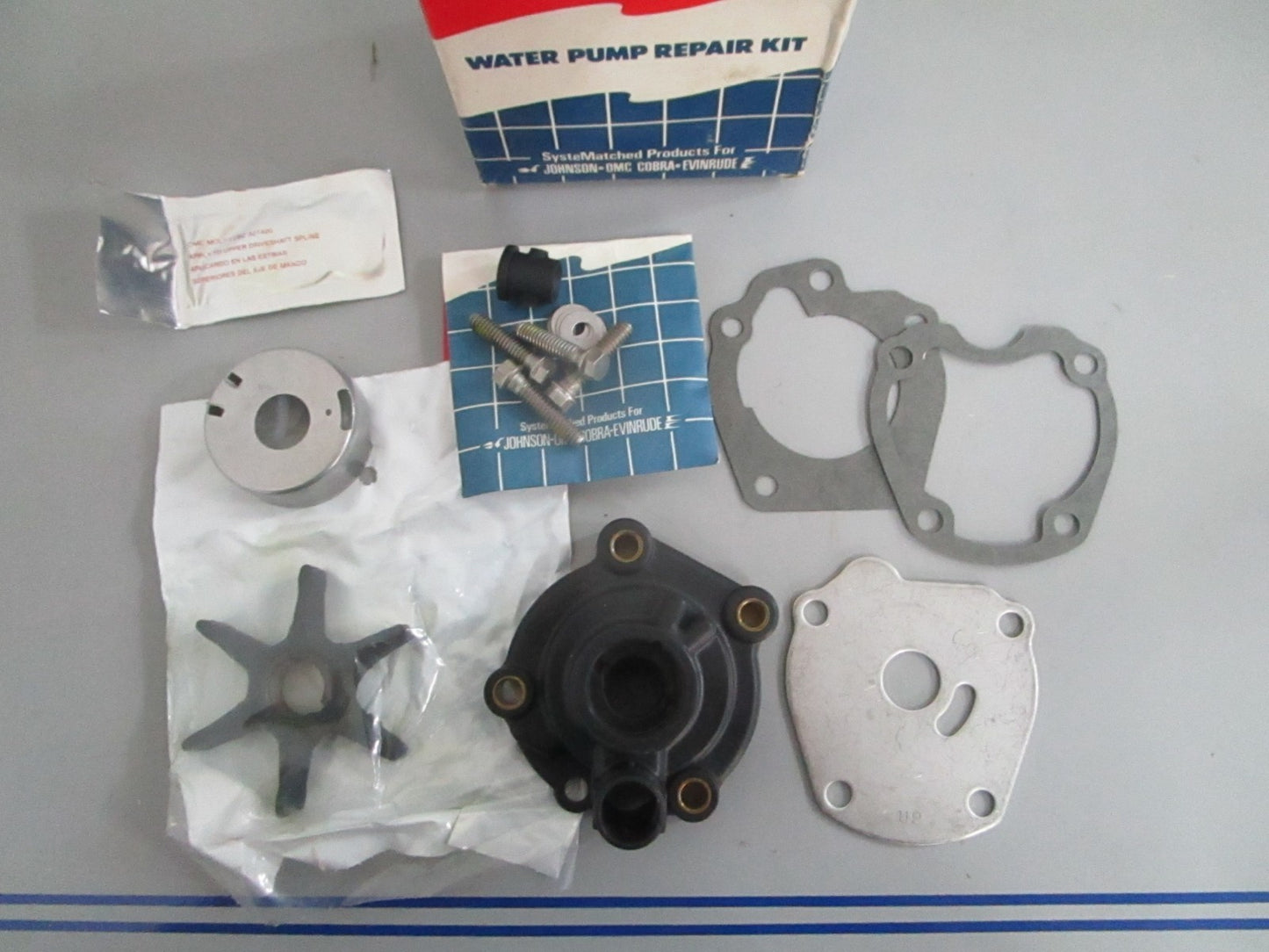 *NEW OEM* 0820 OMC Johnson Evinrude Water Pump Housing w/ Housing 388891 0388891