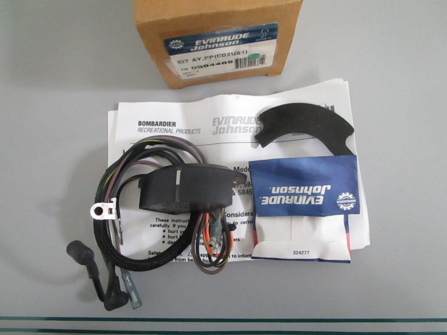NEW OEM 584489 0584489 OMC Johnson Evinrude Power Pack (CD2U61) Kit Assy 0820