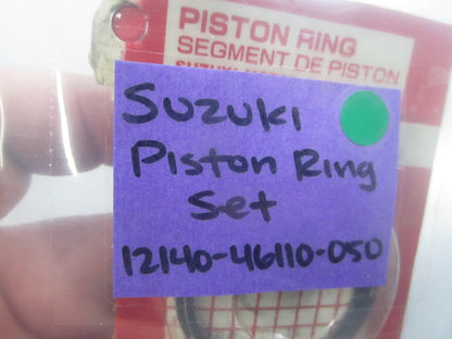 NEW OEM 12140-46110-050 Suzuki Piston Ring Set 0810
