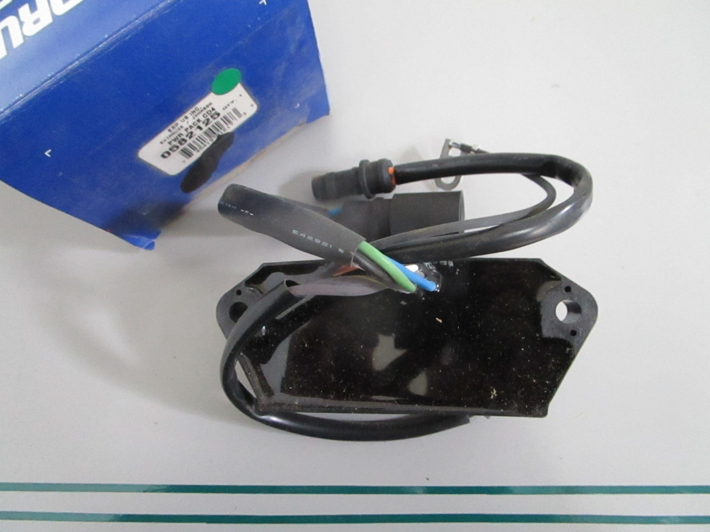 NEW OEM 582125 0582125 OMC Johnson Evinrude Power Pack 0820