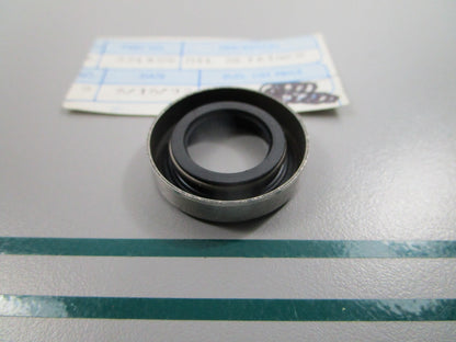 NEW OEM 321459 0321459 OMC Johnson Evinrude Oil Retainer 0810