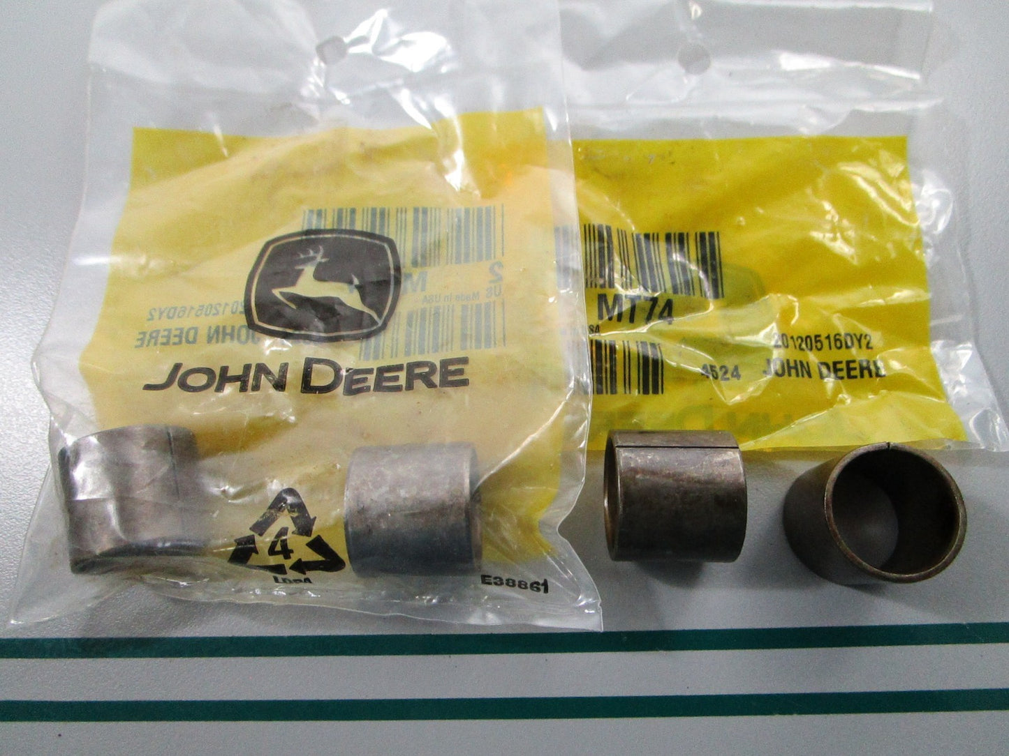 NEW OEM (LOT OF 2) MT74 John Deere 2 Bushing Set 0810