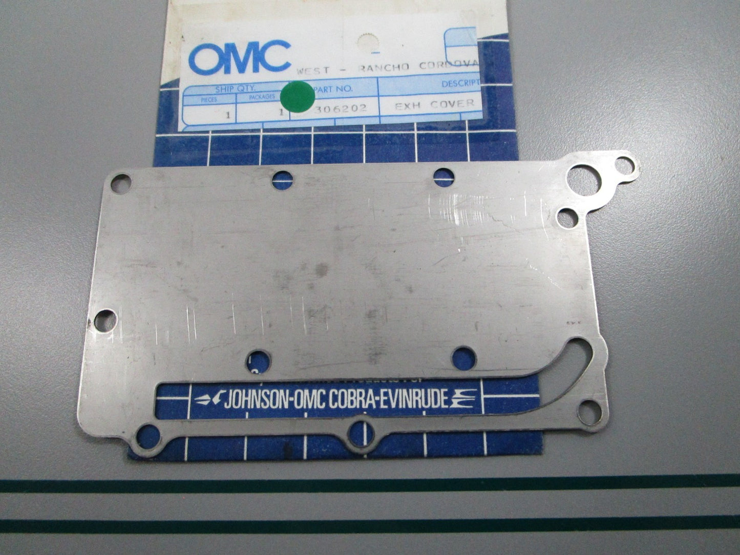 NEW OEM 306202 0306202 OMC Johnson Evinrude Exhaust Cover 0810