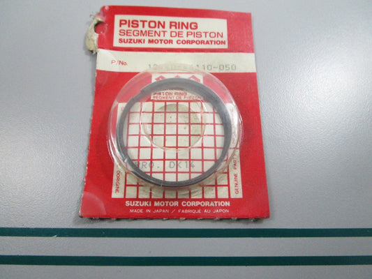 NEW OEM 12140-46110-050 Suzuki Piston Ring Set 0810