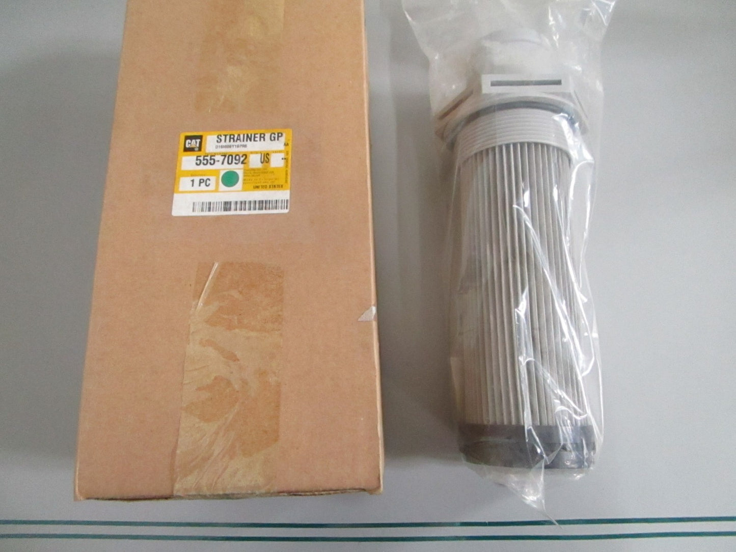 Caterpillar 555-7092 NEW OEM Strainer CAT Heavy Equipment Genuine Factory 0820