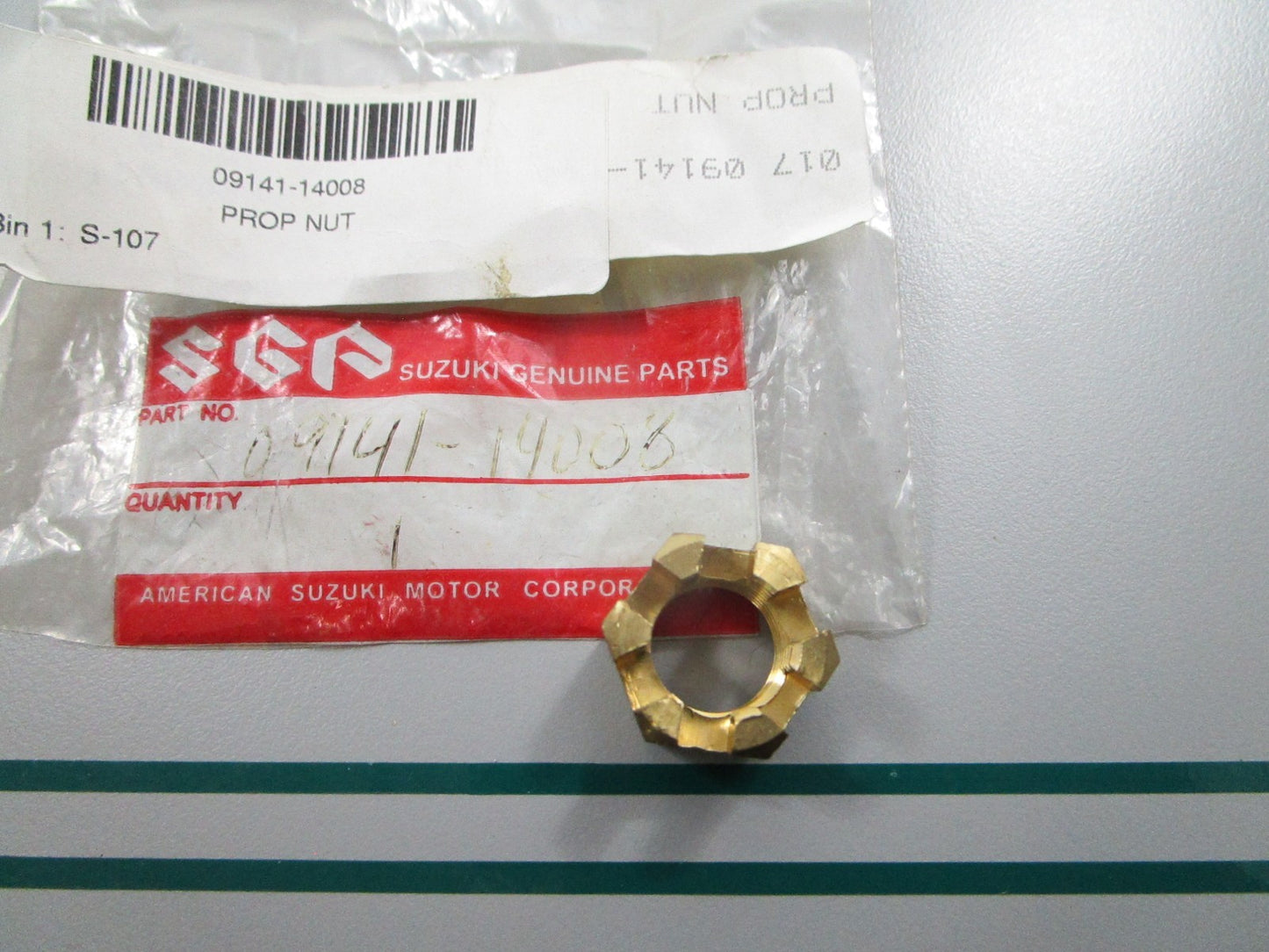 NEW OEM 09141-14008 Suzuki Propeller Nut 0810