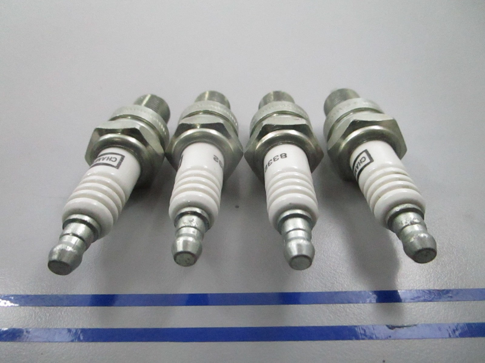 *NEW OEM* (LOT OF 4) 0810 Champion Spark Plug 8332