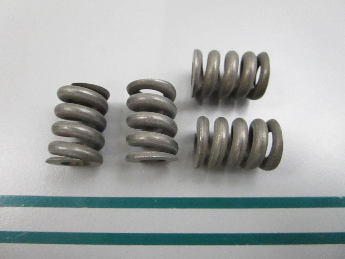 NEW OEM (LOT OF 4) 309825 0309825 OMC Johnson Evinrude Friction Spring 0810