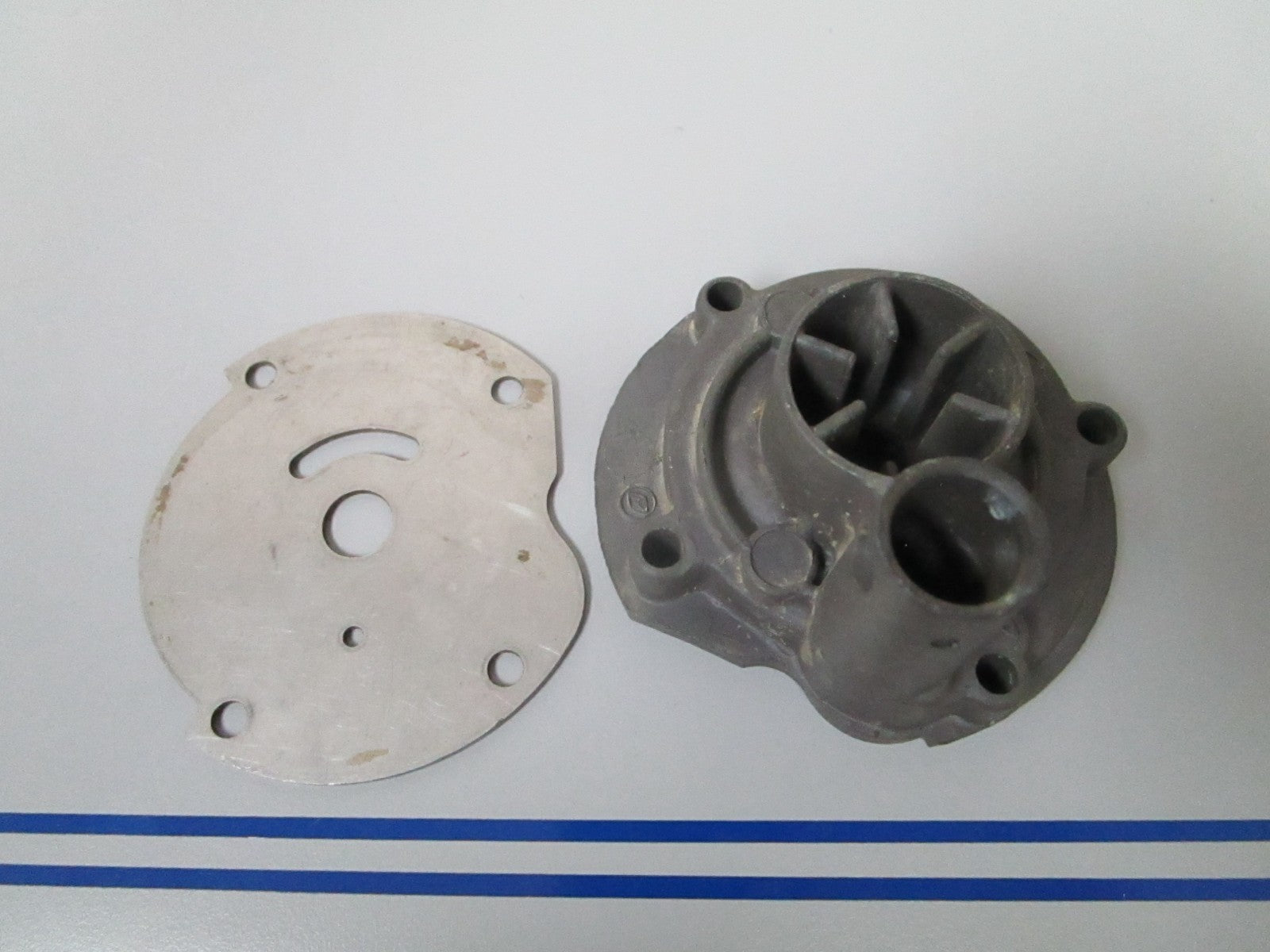 NEW OEM 303442 0303442 OMC Johnson Evinrude Impeller Housing & Plate 0720