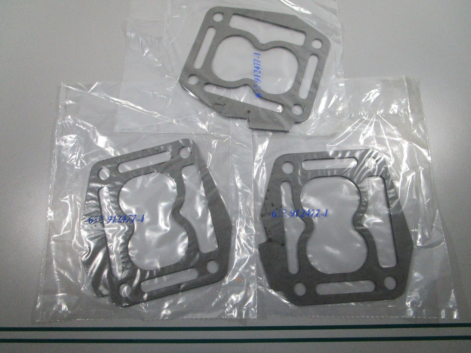 NEW OEM (LOT OF 3) 912477 0912477 OMC Johnson Evinrude Gasket 0810