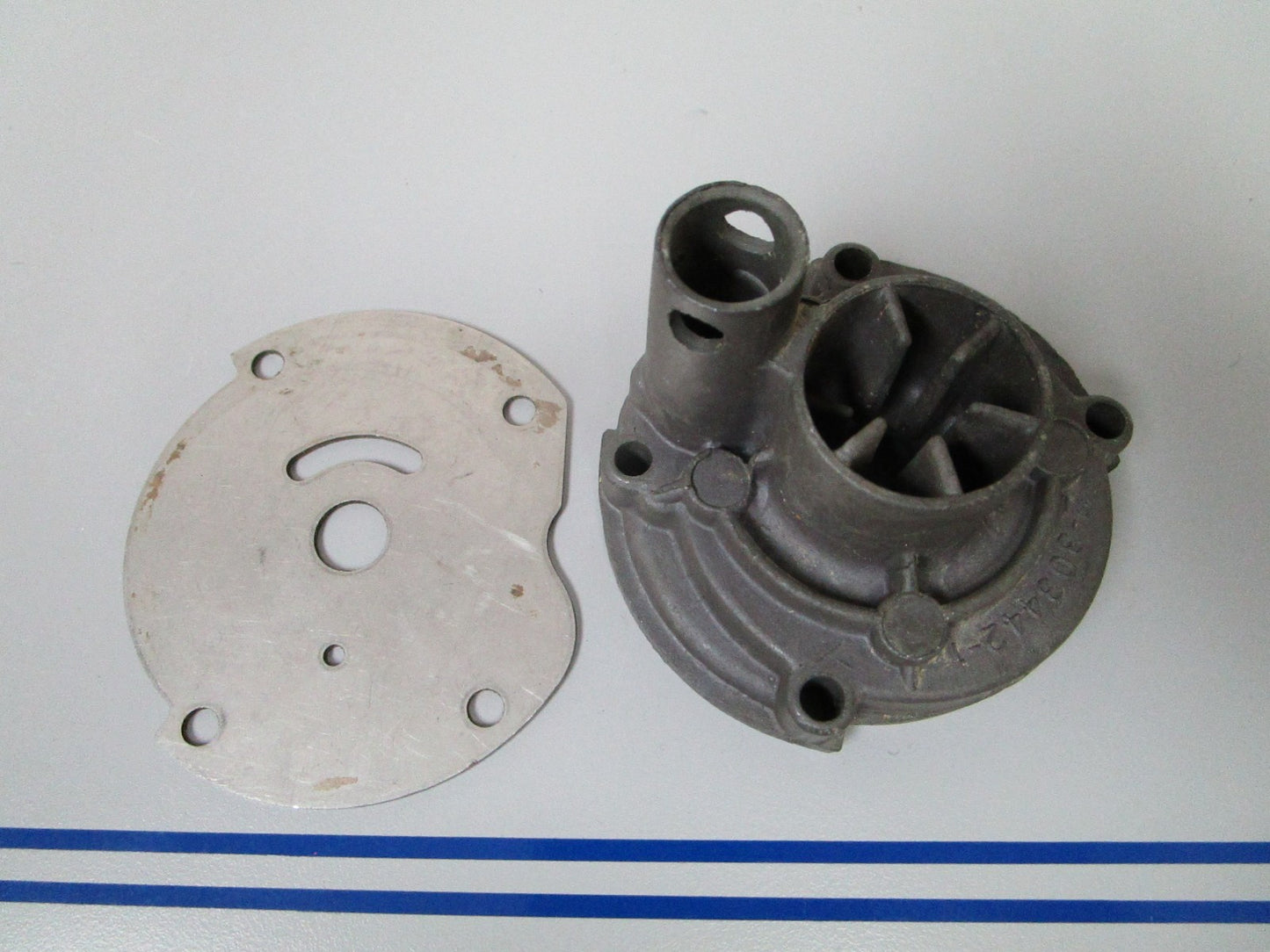NEW OEM 303442 0303442 OMC Johnson Evinrude Impeller Housing & Plate 0720