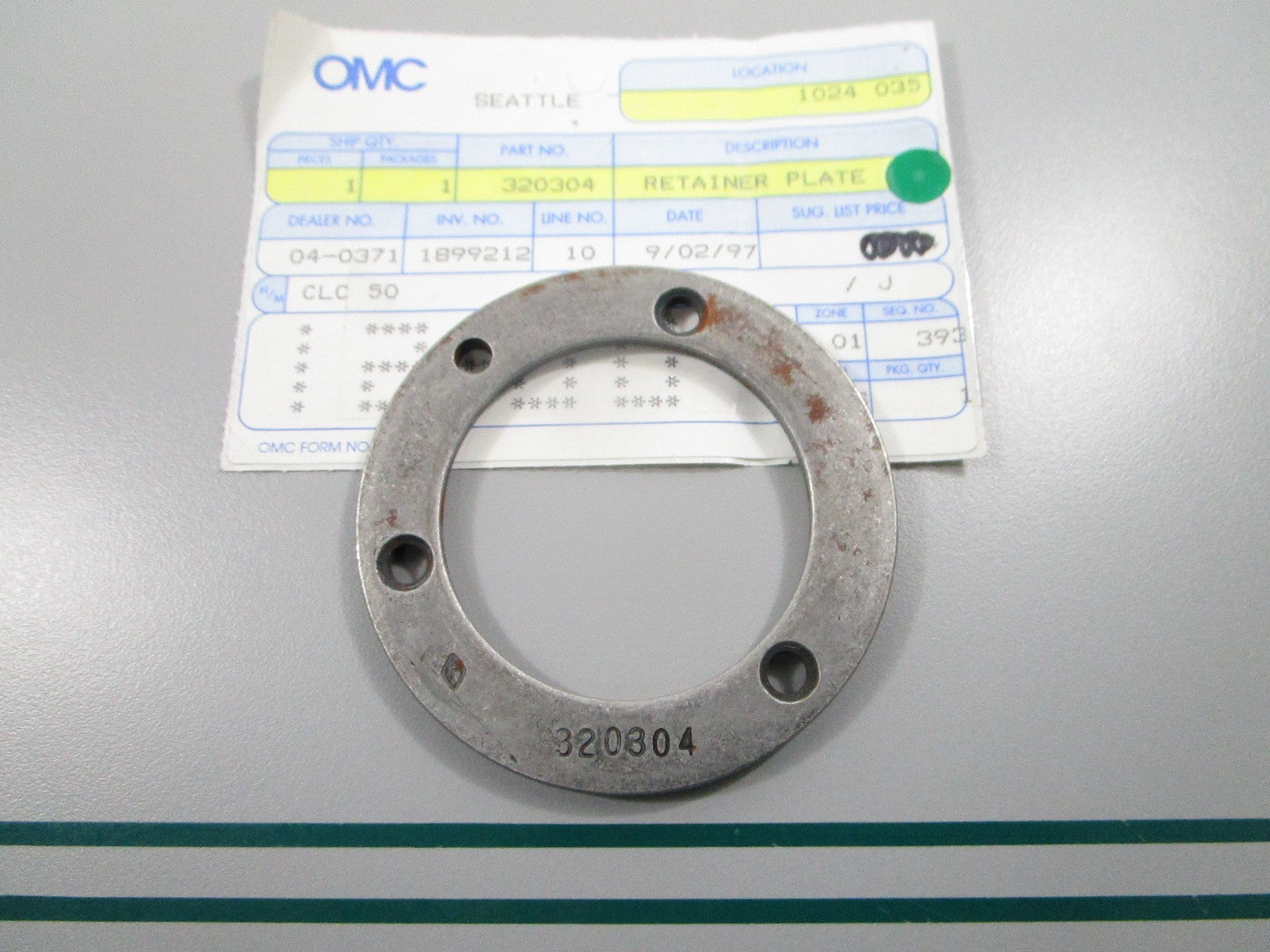 NEW OEM 320304 0320304 OMC Johnson Evinrude Retainer Plate 0810