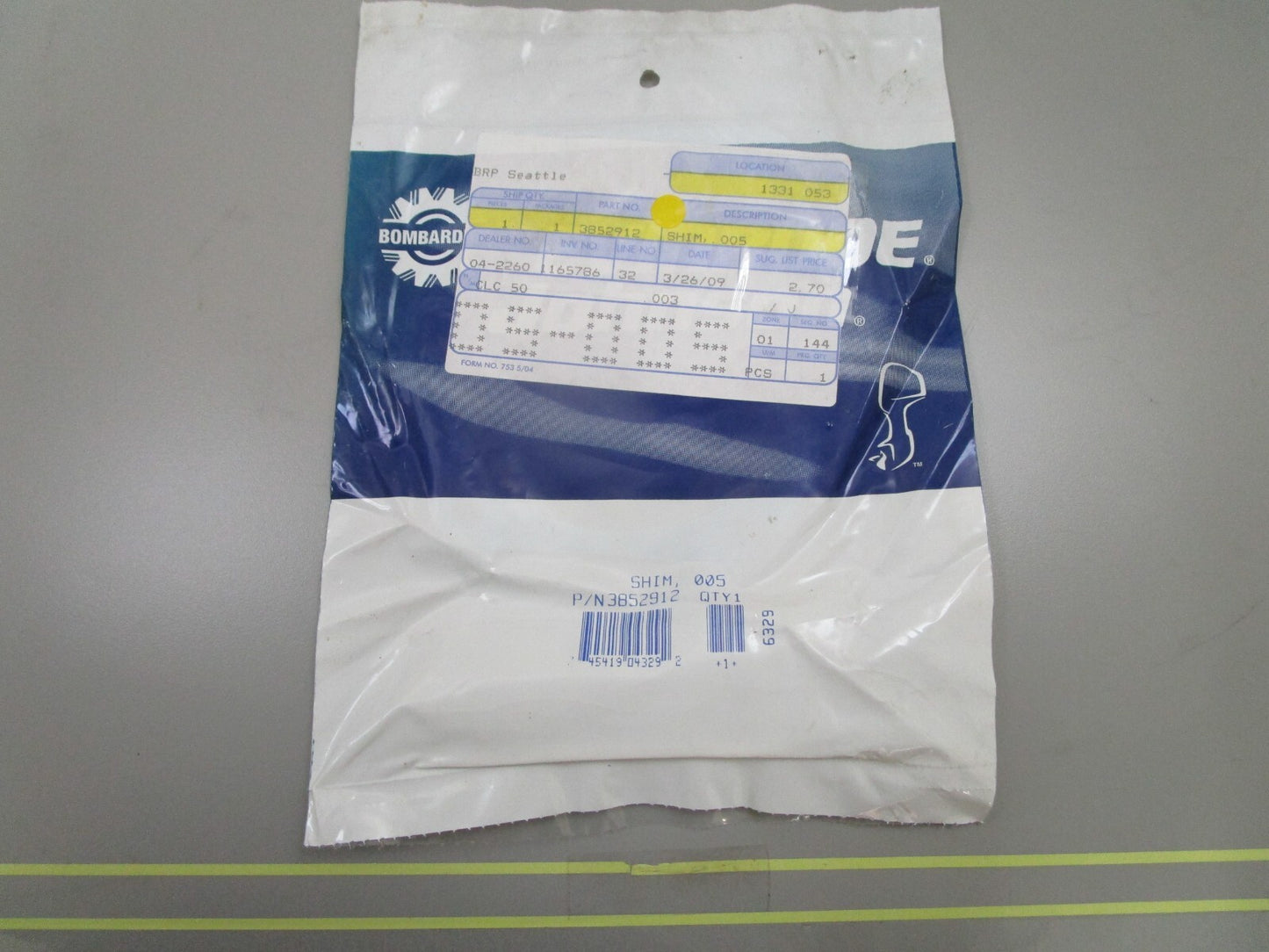 *NEW OEM* 0750 OMC Johnson Evinrude  SHIM  .005  3852912