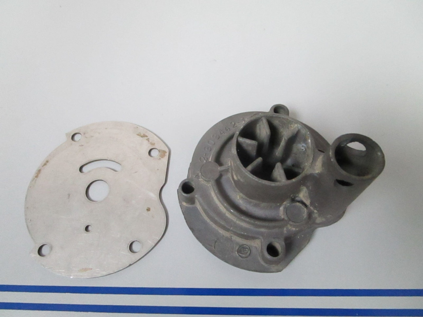 NEW OEM 303442 0303442 OMC Johnson Evinrude Impeller Housing & Plate 0720