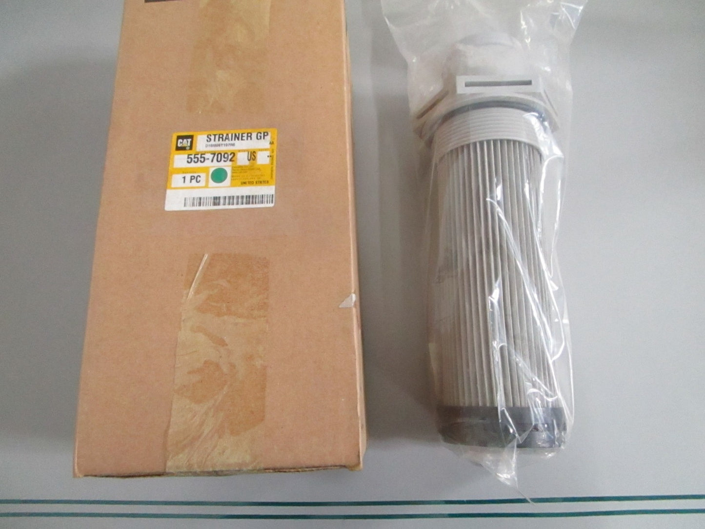 Caterpillar 555-7092 NEW OEM Strainer CAT Heavy Equipment Genuine Factory 0820