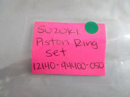 NEW OEM 12140-94400-050 Suzuki Piston Ring Set 0820